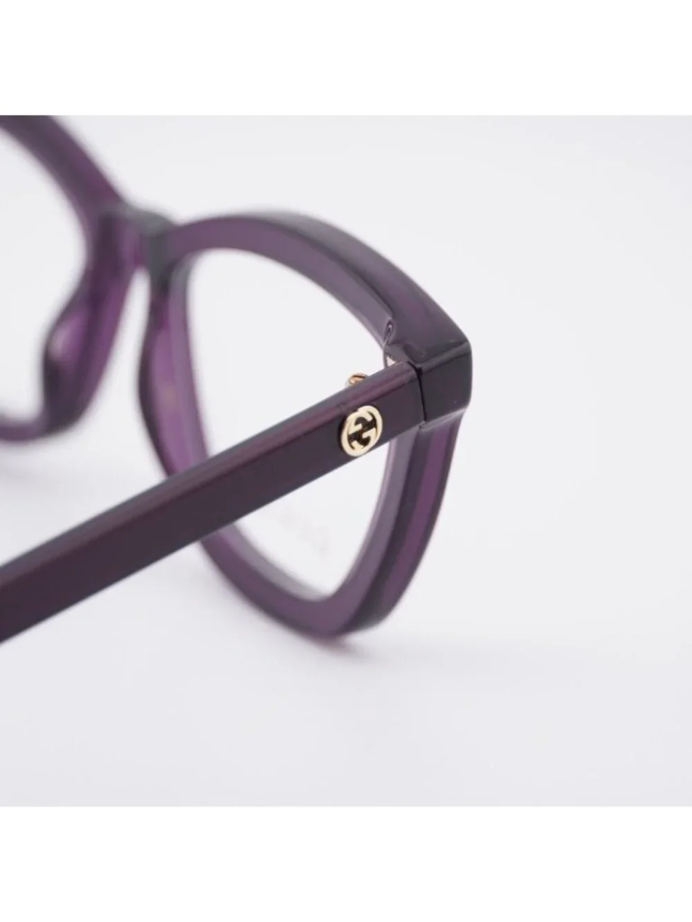 Gucci GG1686O 011 Eyeglasses Shiny Transparent Dark Purple 54mm Cat Eye Frame